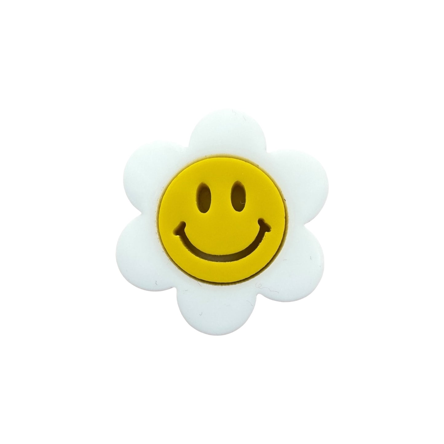 Flower-shaped pin with a smiley face on a white background