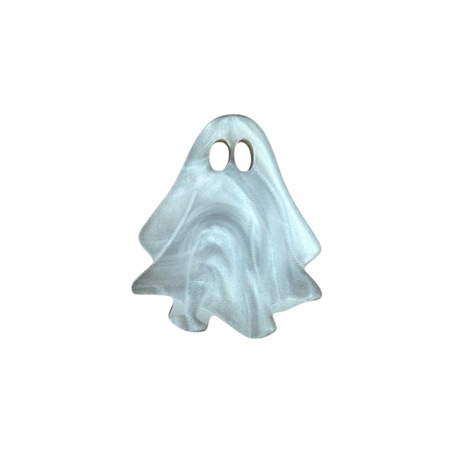 White Ghost-shaped pin on a white background