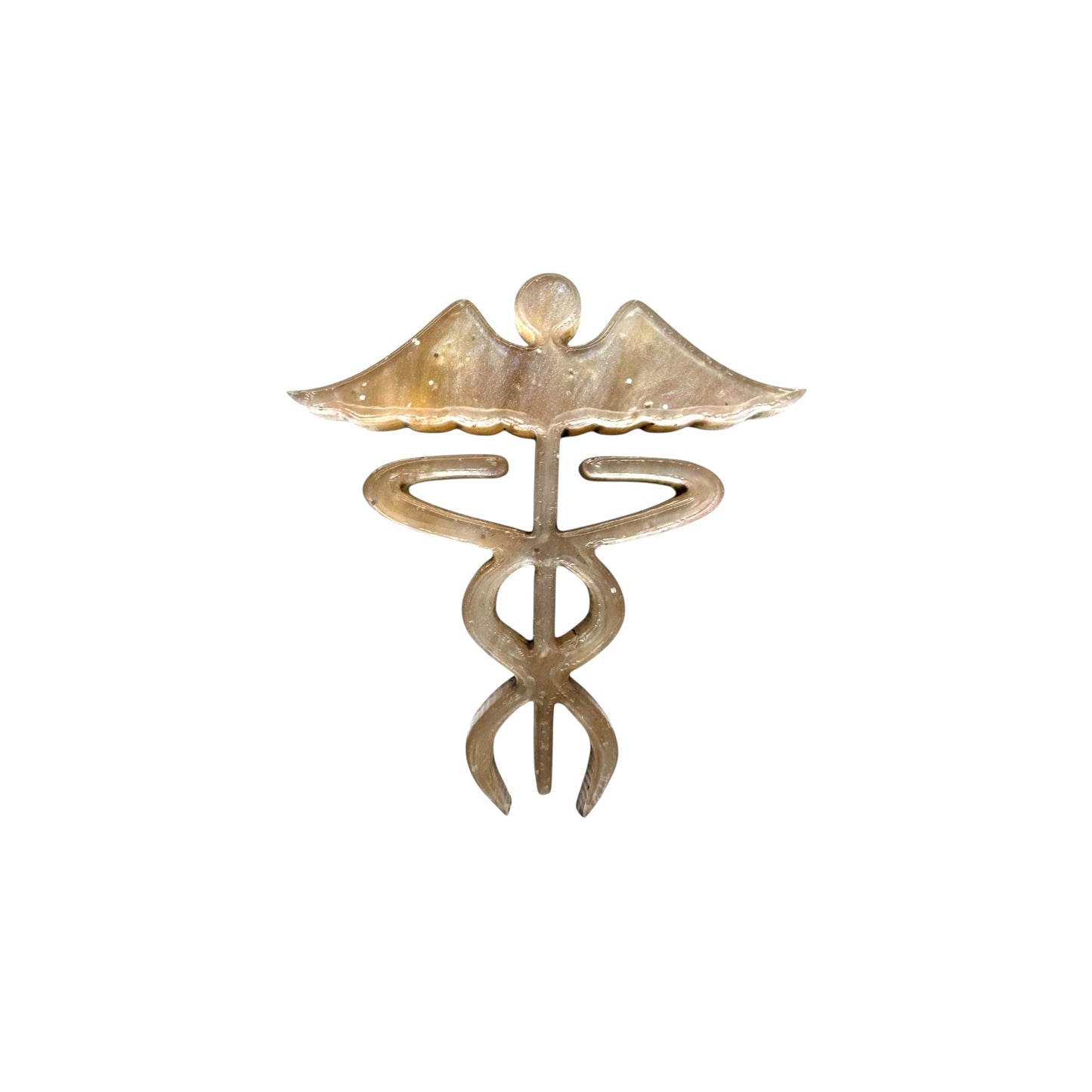 Gold caduceus-shaped pin on a white background