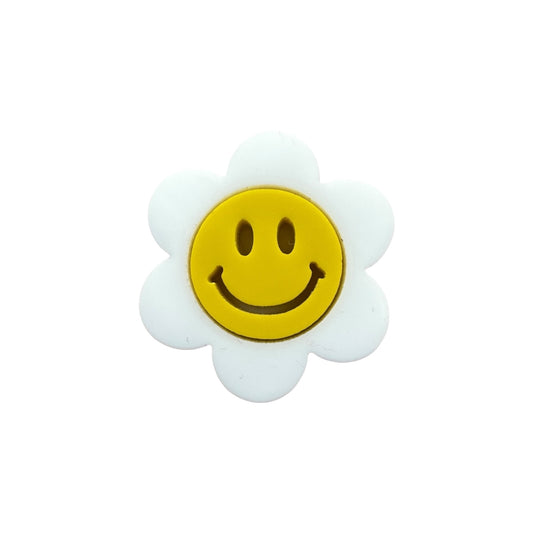 Flower-shaped pin with a smiley face on a white background

