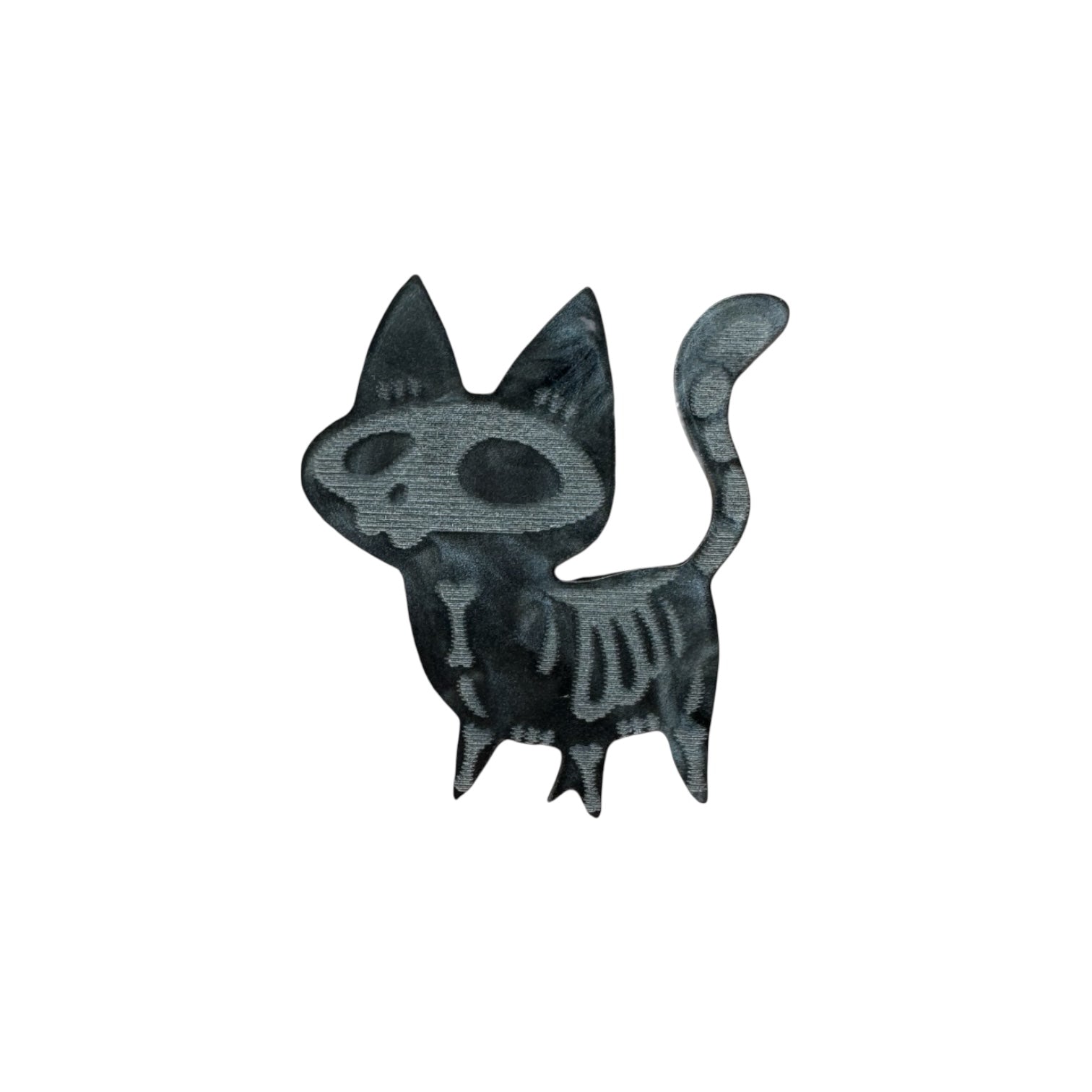 Black and grey skeleton cat designed pin on a white background

