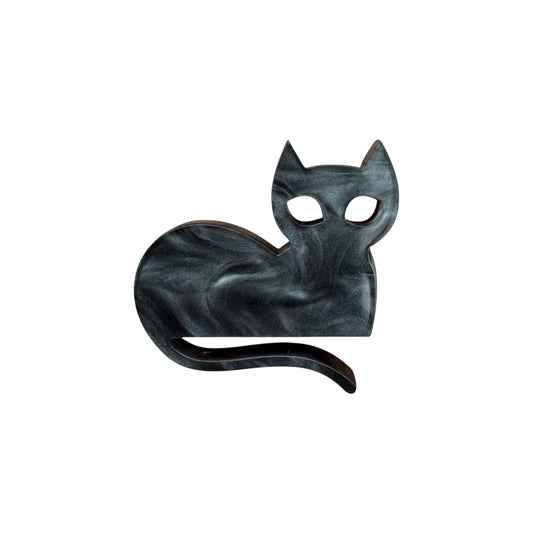Black cat-shaped pin on a white background

