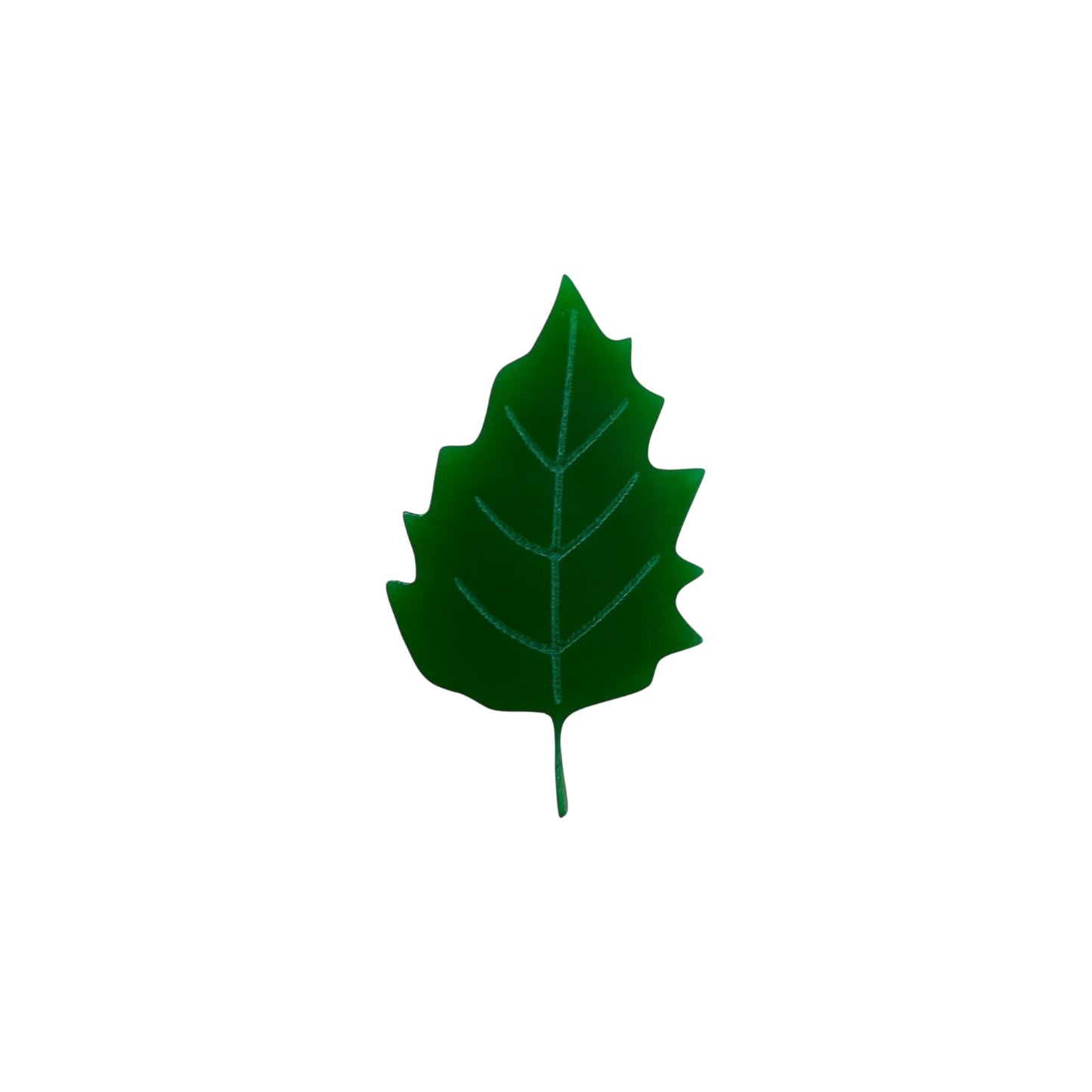 Green leaf shaped pin on a white background

