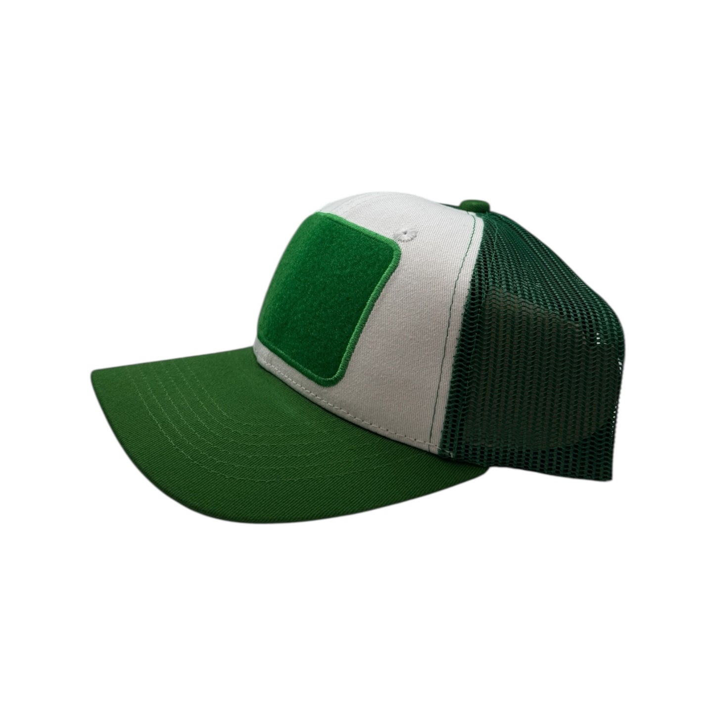 Green and white trucker cap with green mesh back on a white background