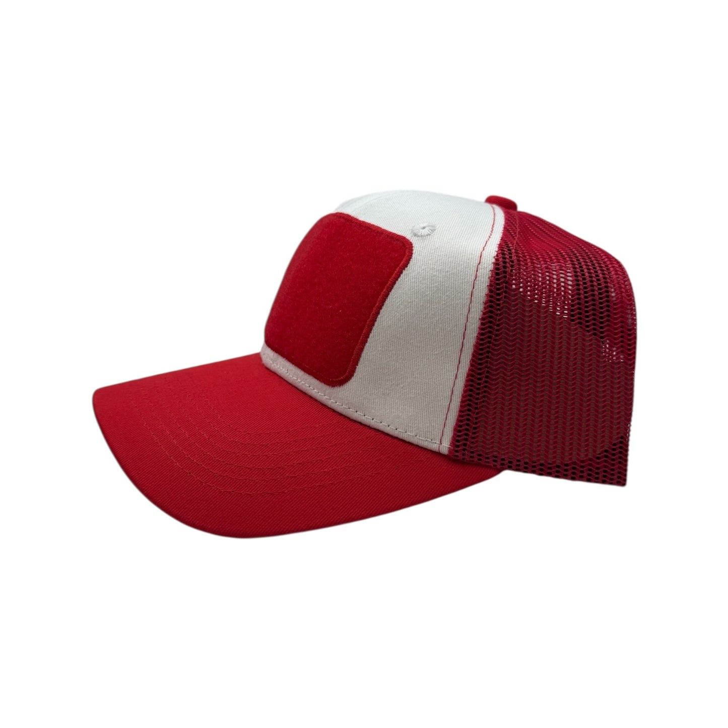 Red and white cap with mesh back on a white background