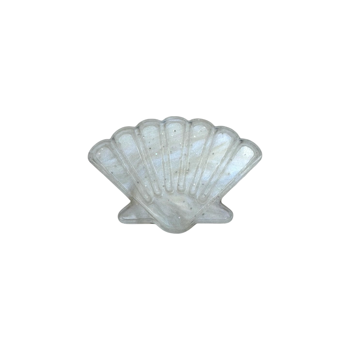 White Shell-shaped pin on a white background

